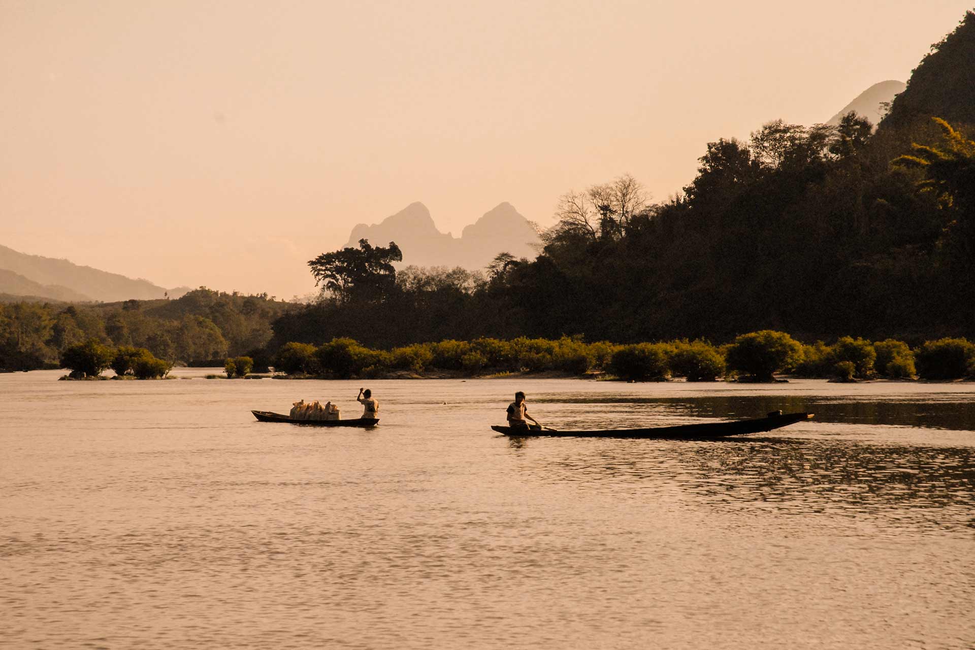 Photograph the tranquil spirit of Laos’ river adventures